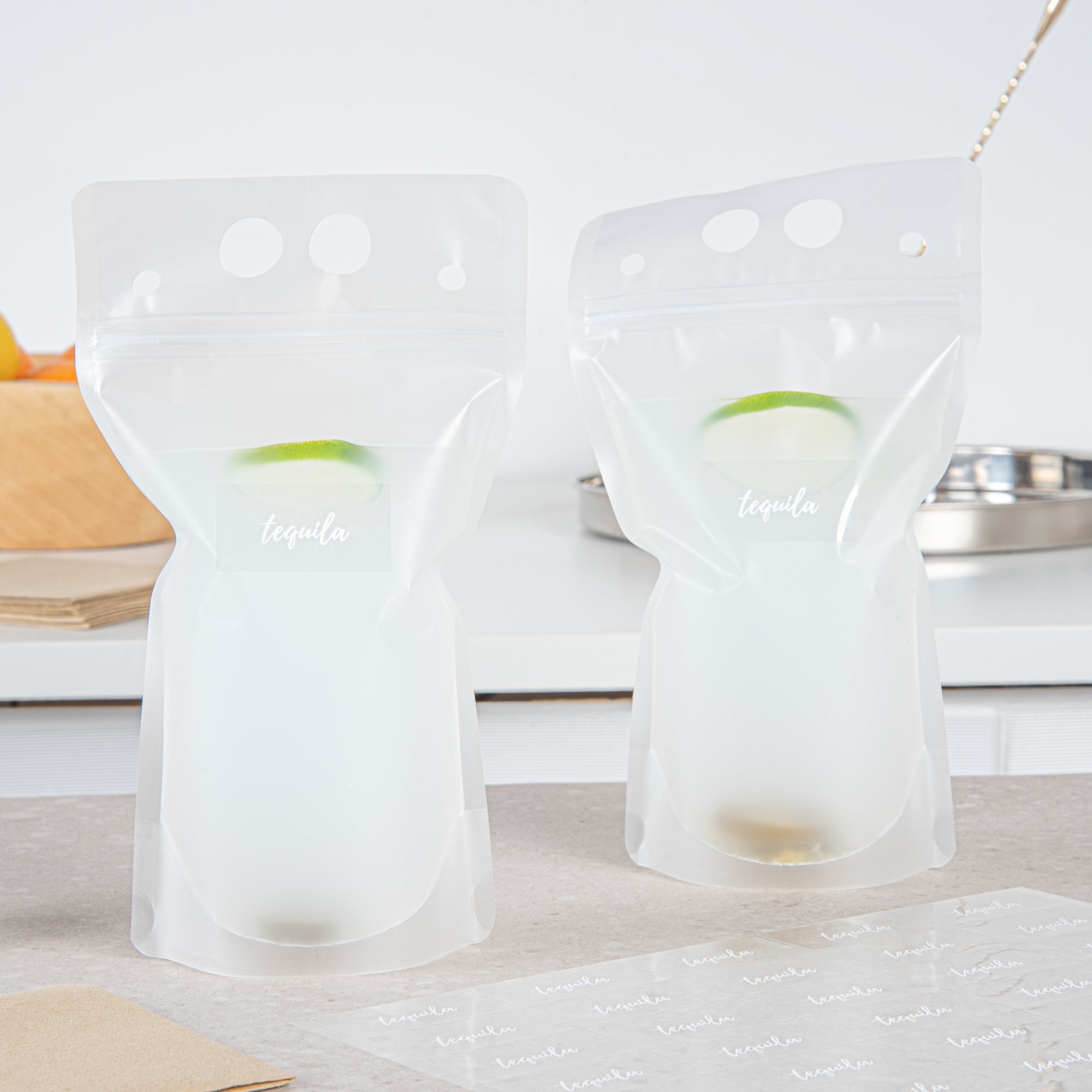 Label Tek Plastic Tequila Label - Clear with White Font, Water-Resistant - 2" x 1" - 100 count box