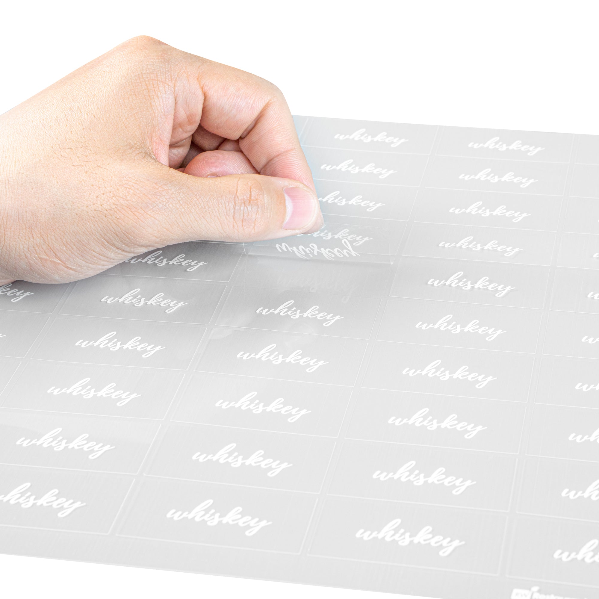 Label Tek Plastic Whiskey Label - Clear with White Font, Water-Resistant - 2" x 1" - 100 count box