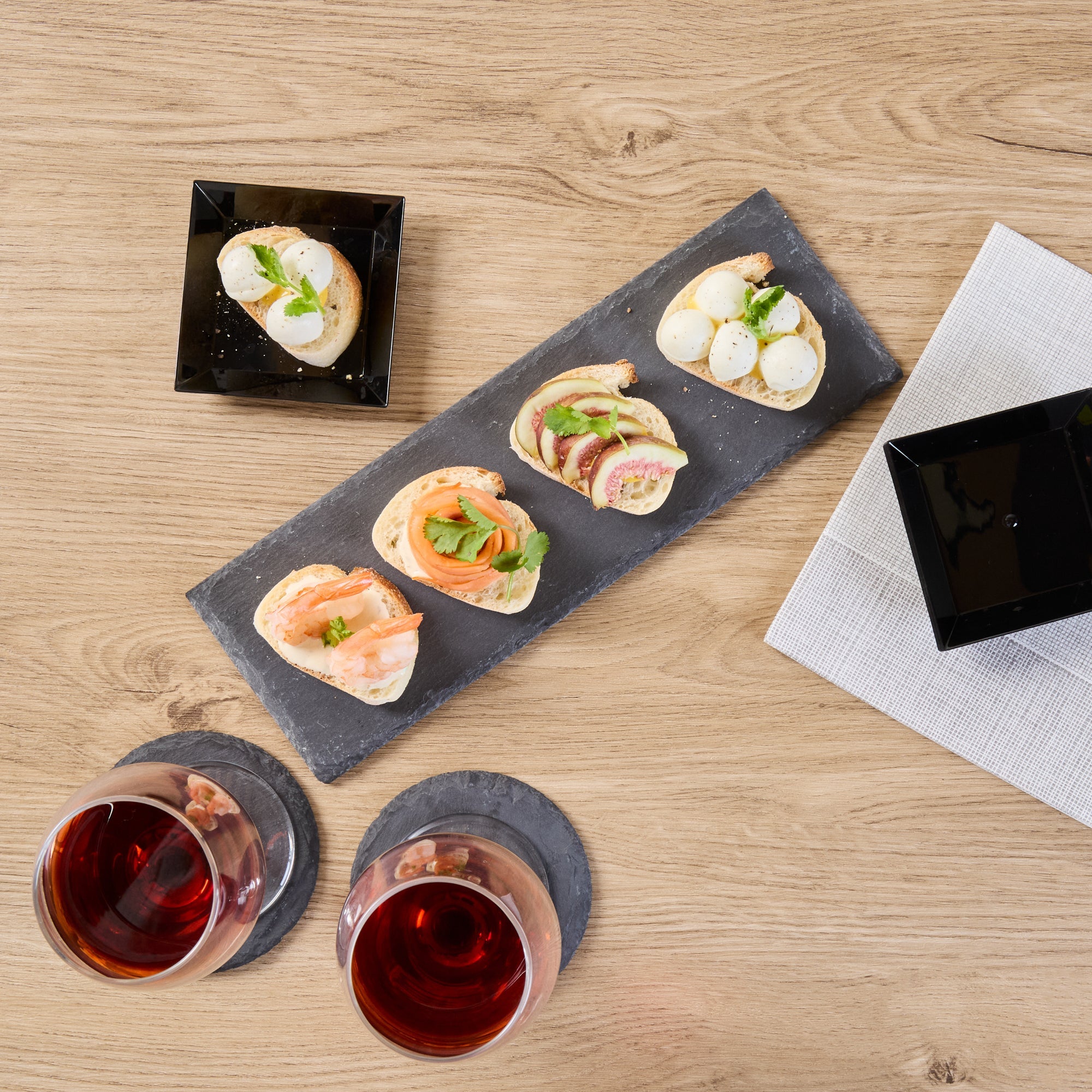 Stone Tek Rectangle Black Slate Serving Tray - 11 3/4" x 4" - 4 count box