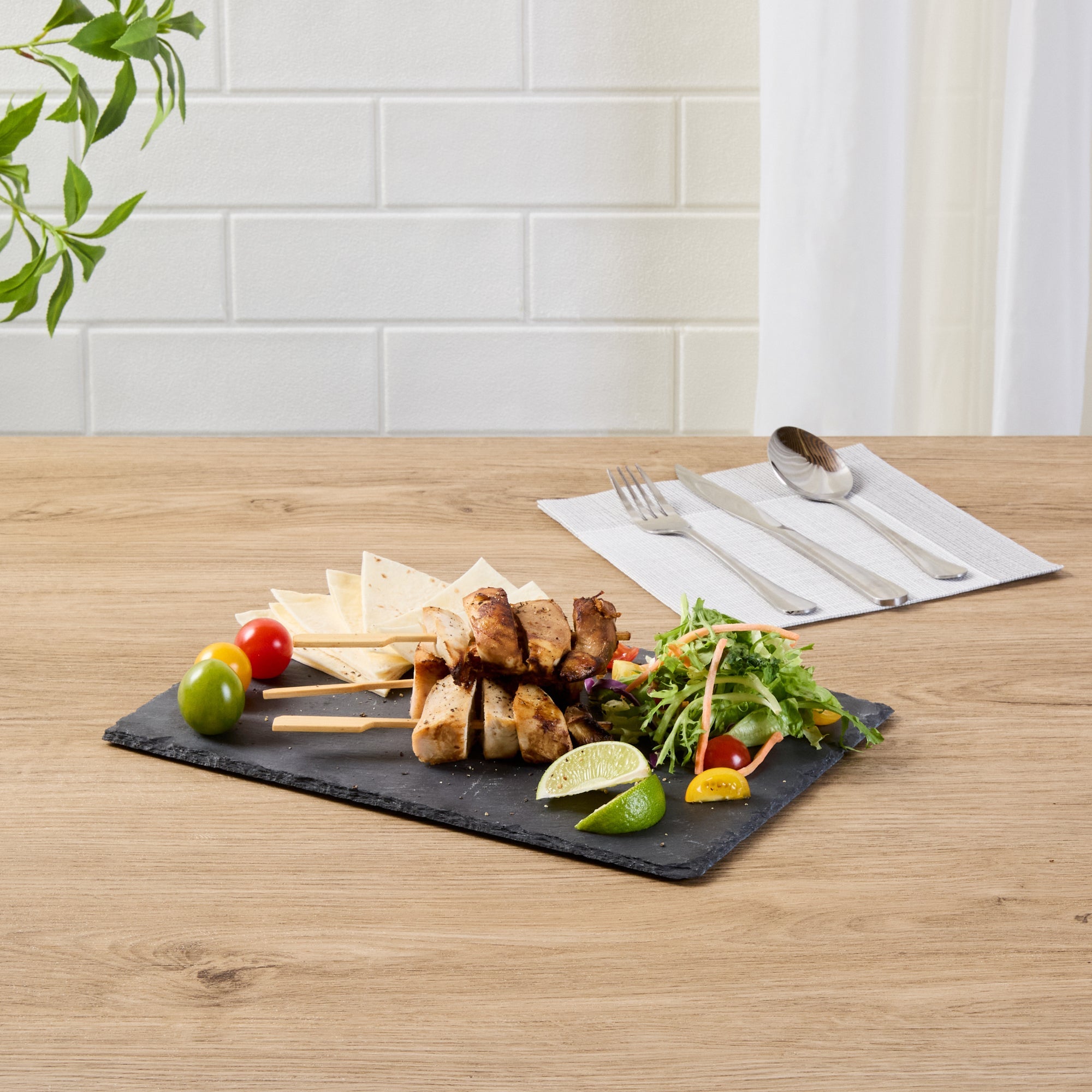 Stone Tek Rectangle Black Slate Serving Tray - 11 3/4" x 7 3/4" - 4 count box