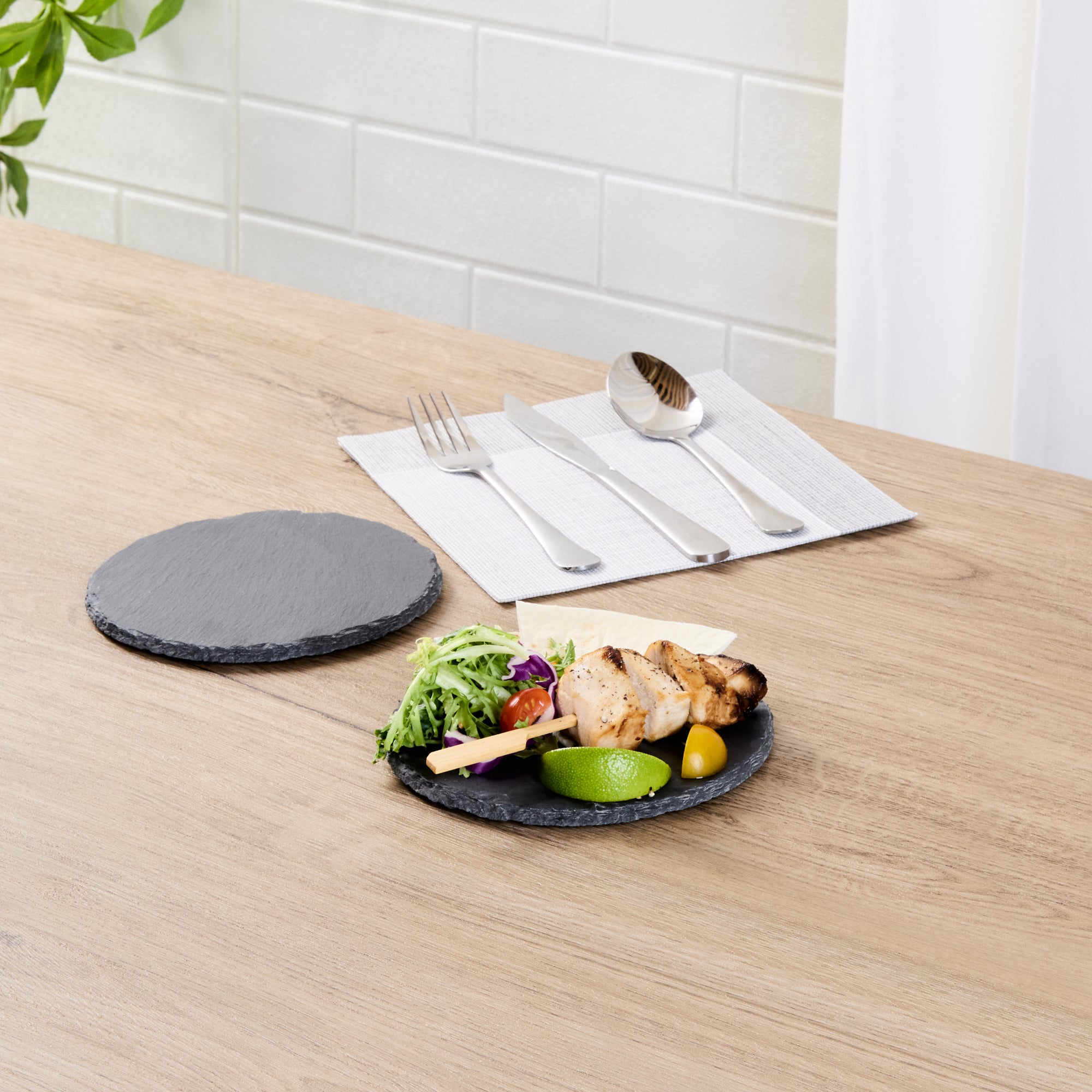 Stone Tek Round Black Slate Serving Plate - 6" x 6" - 10 count box