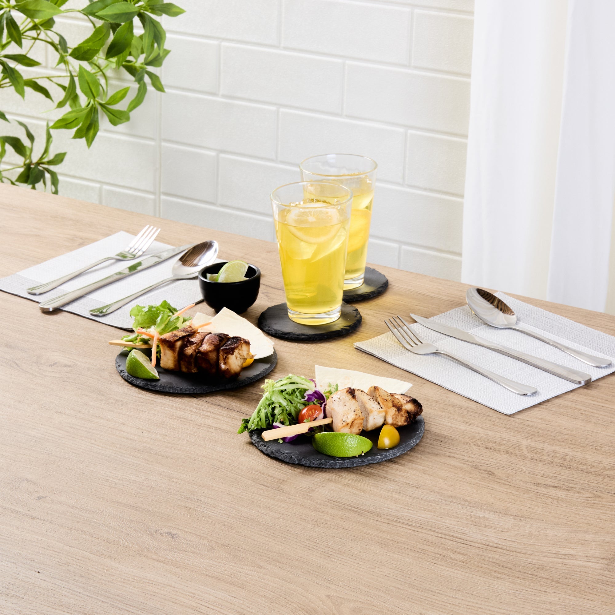 Stone Tek Round Black Slate Serving Plate - 6" x 6" - 10 count box