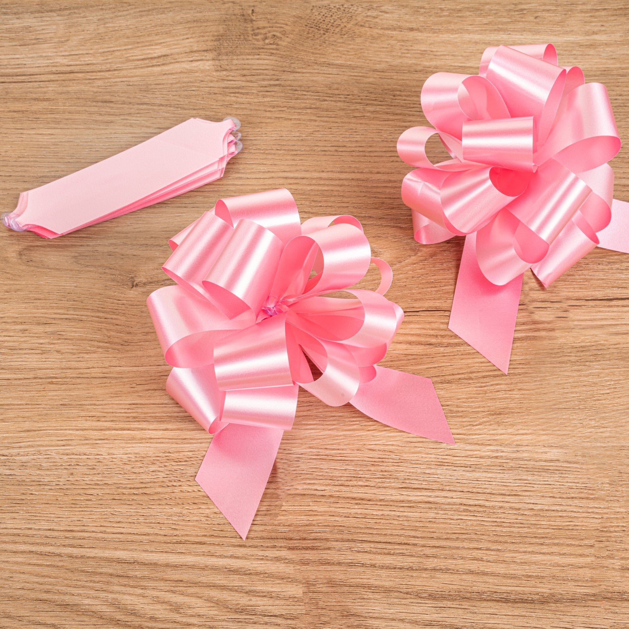 Gift Tek Light Pink Plastic Flora Satin Pull Bow - 5 1/2" - 1000 count box