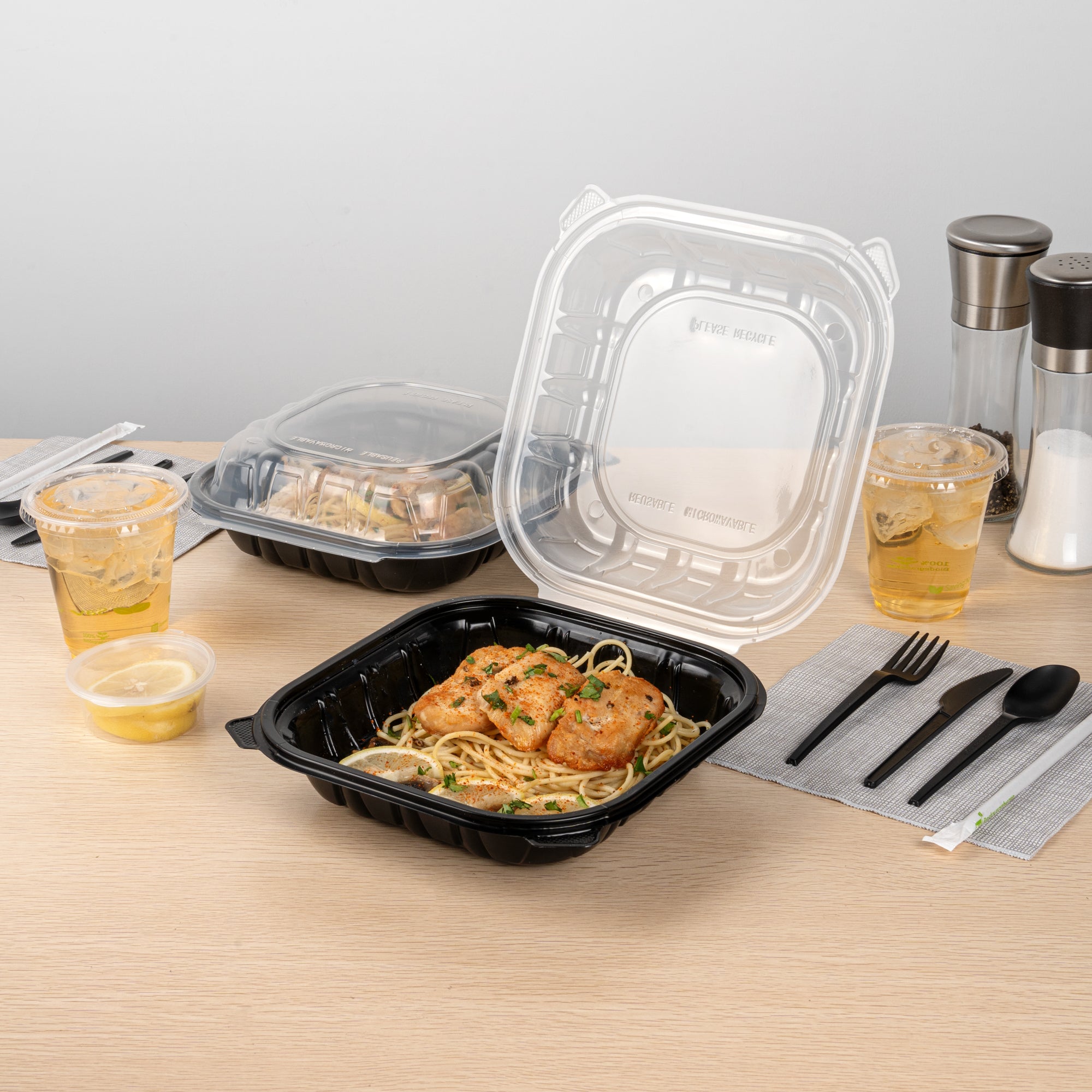 Thermo Tek 40 oz Black Plastic Clamshell Container - Microwavable - 9" x 9" x 3" - 100 count box