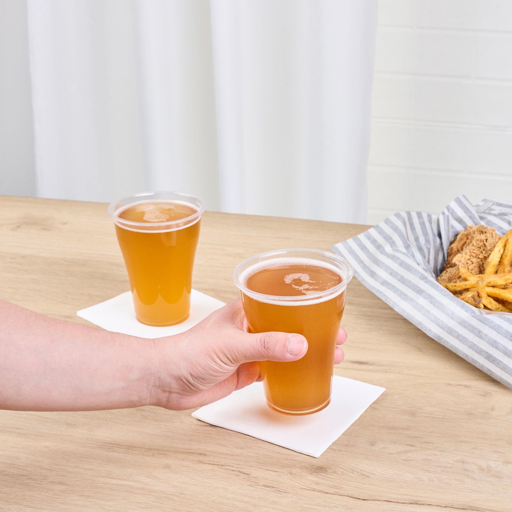 Basic Nature 14 oz Clear PLA Plastic Beer Glass - Compostable - 3 3/4" x 3 3/4" x 4 1/2" - 1000 count box
