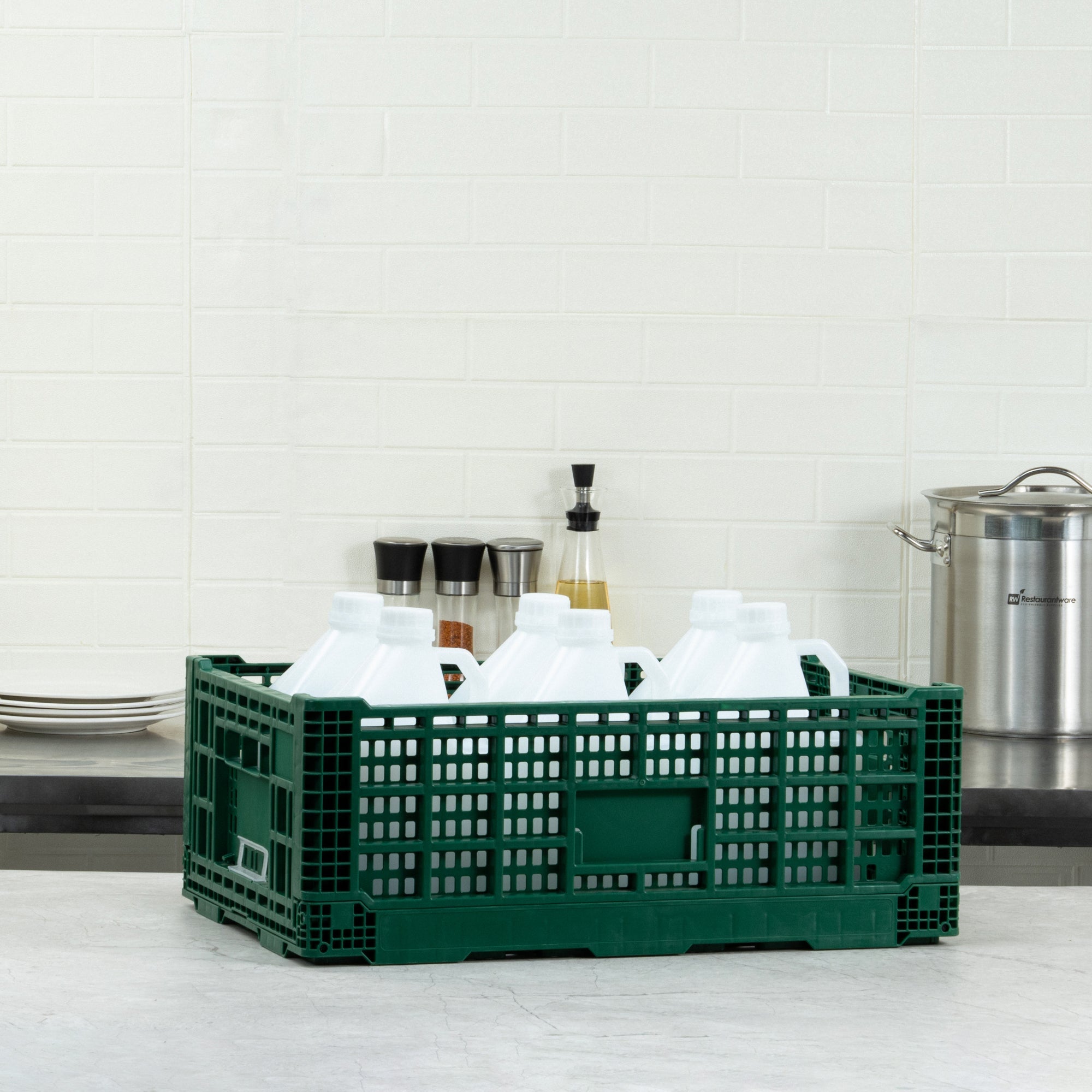 Cater Tek Rectangle Green Plastic 36L Collapsible Milk Crate - Stackable - 23 1/2" x 15 3/4" x 8 1/2" - 1 count box
