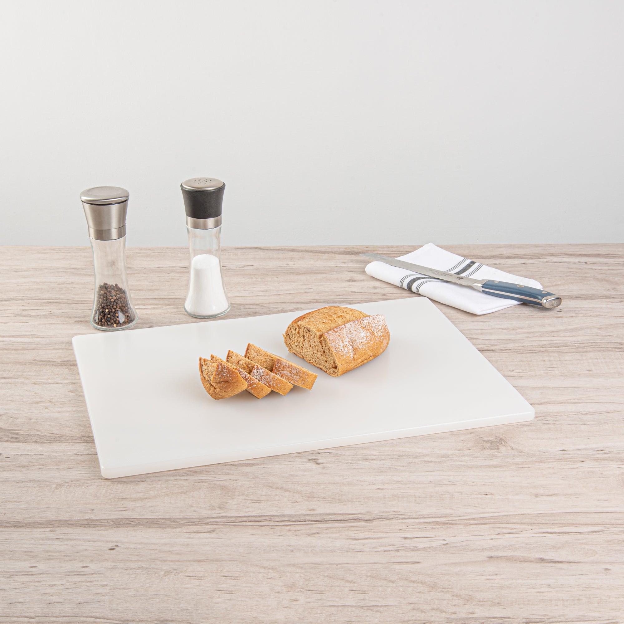 Chef 101 White Plastic Cutting Board - 20" x 15" x 1/2" - 10 count box