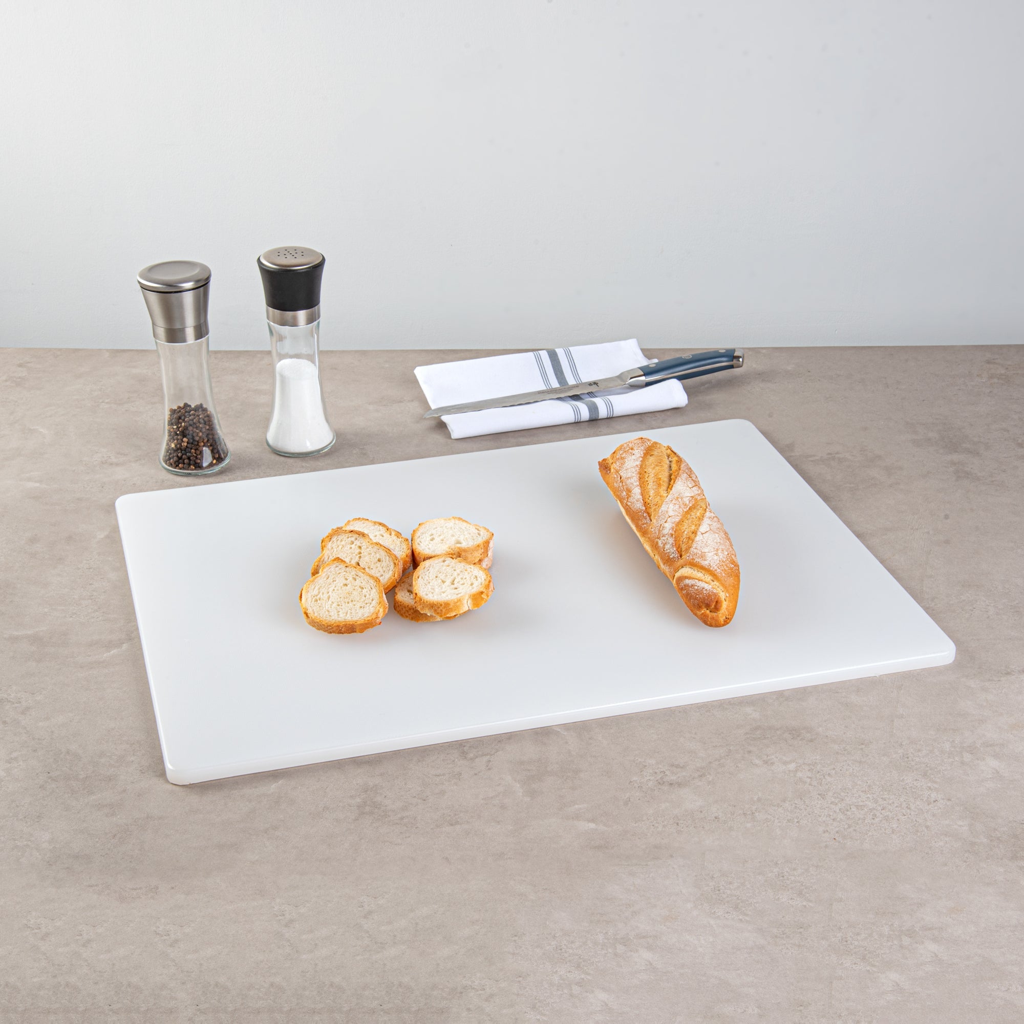 Chef 101 White Plastic Cutting Board - 24" x 18" x 1/2" - 10 count box