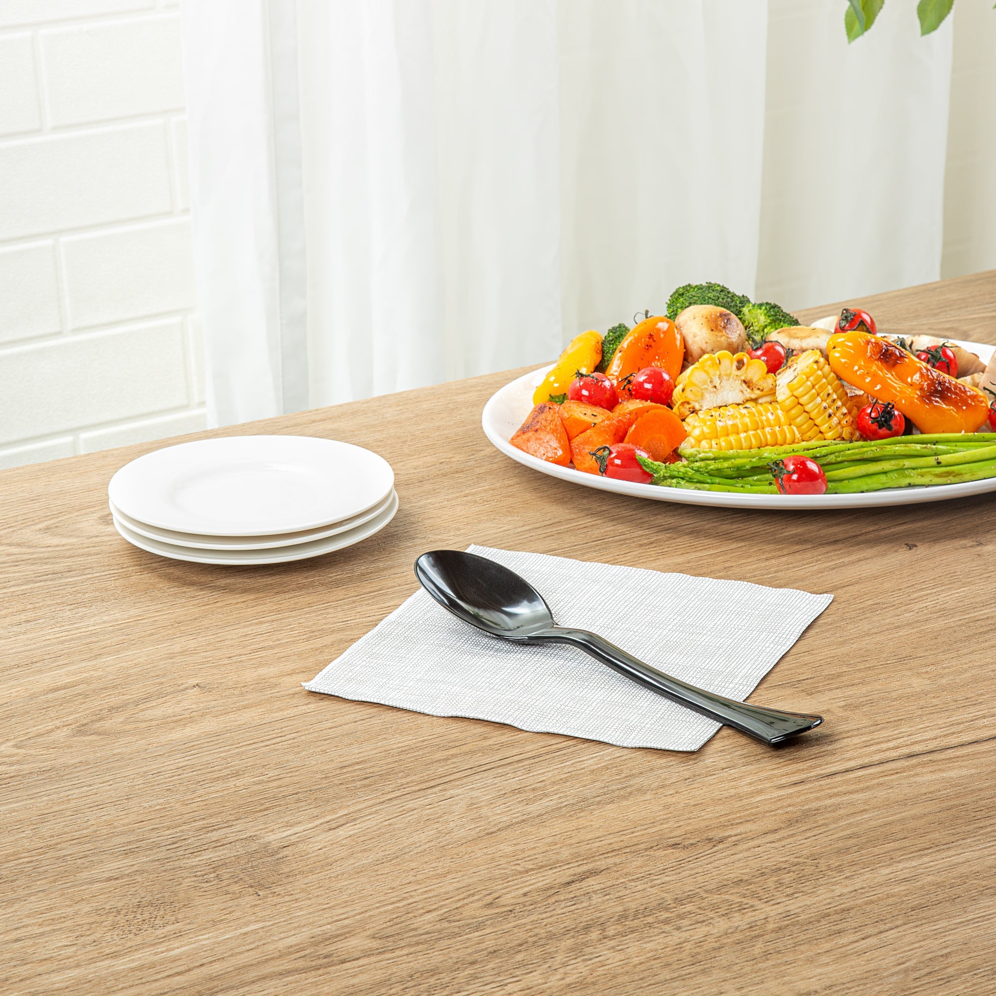 Cater Tek Black Plastic Serving Spoon - 9 3/4" - 100 count box
