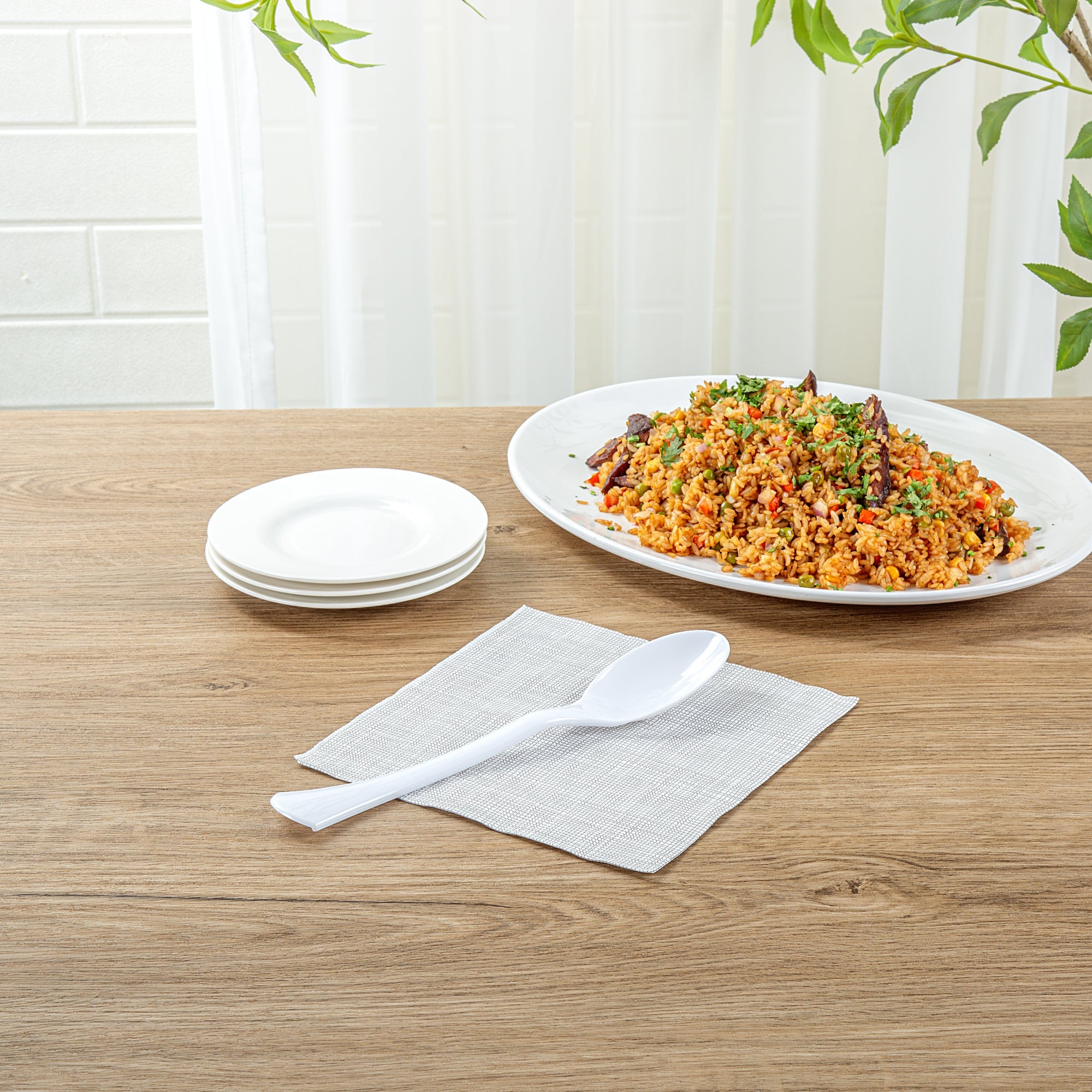 Cater Tek White Plastic Serving Spoon - 9 3/4" - 100 count box