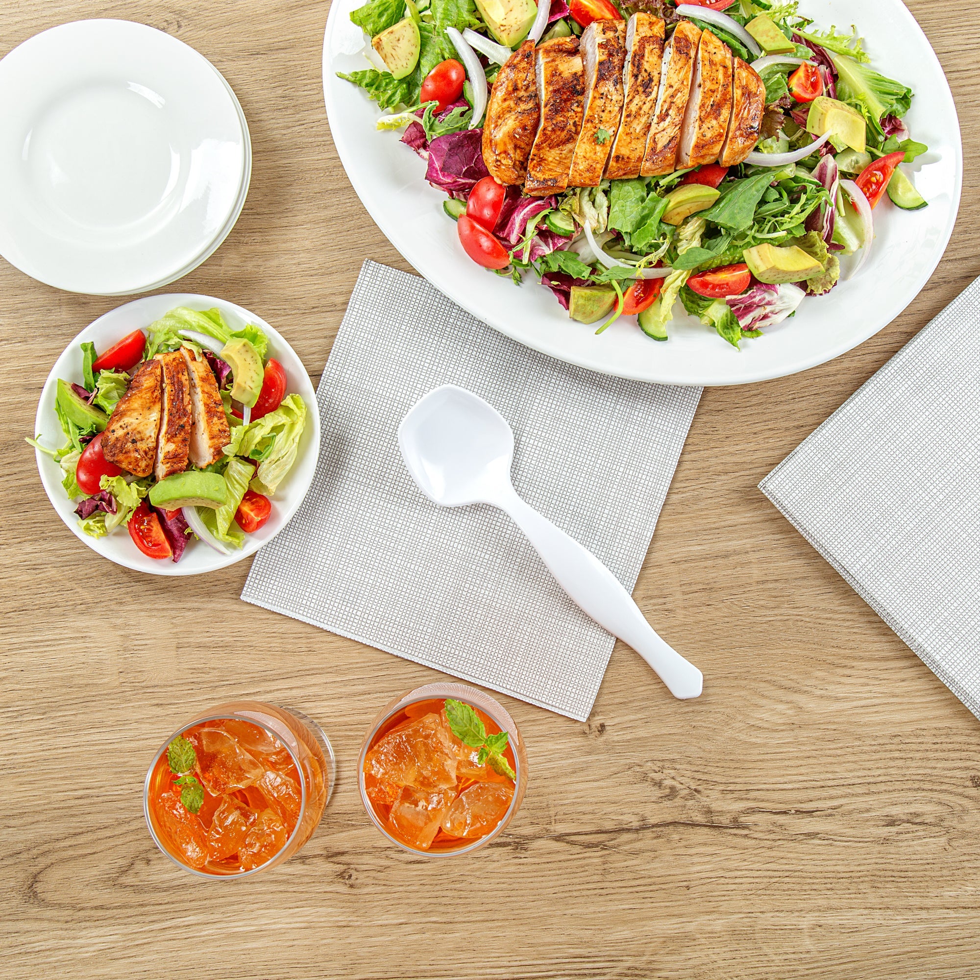 Cater Tek White Plastic Serving Spoon - 8 1/2" - 100 count box
