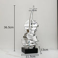 DecorBites™ Golden Violin Sculpture Resin Art Ornament Stack Violin Statue Decor