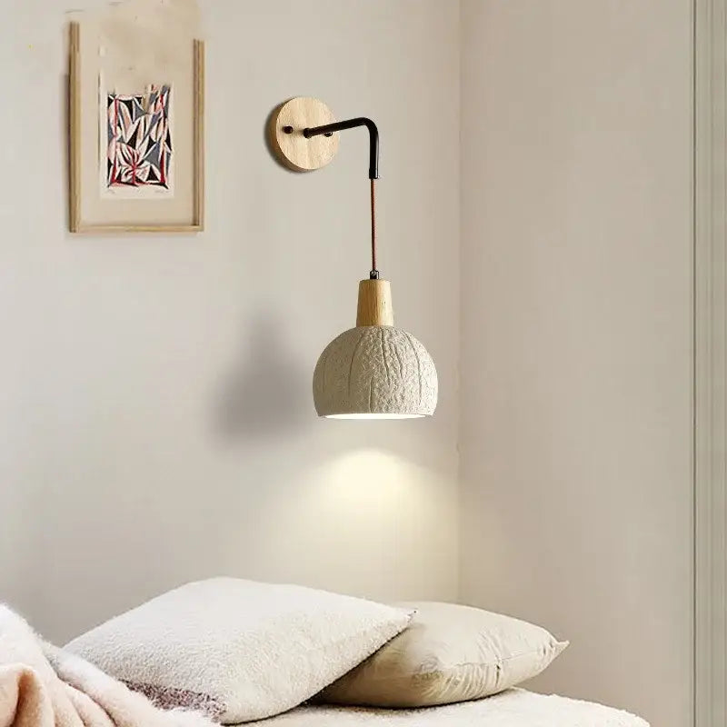 Beige ceramic wall sconce with pull chain switch for bedroom