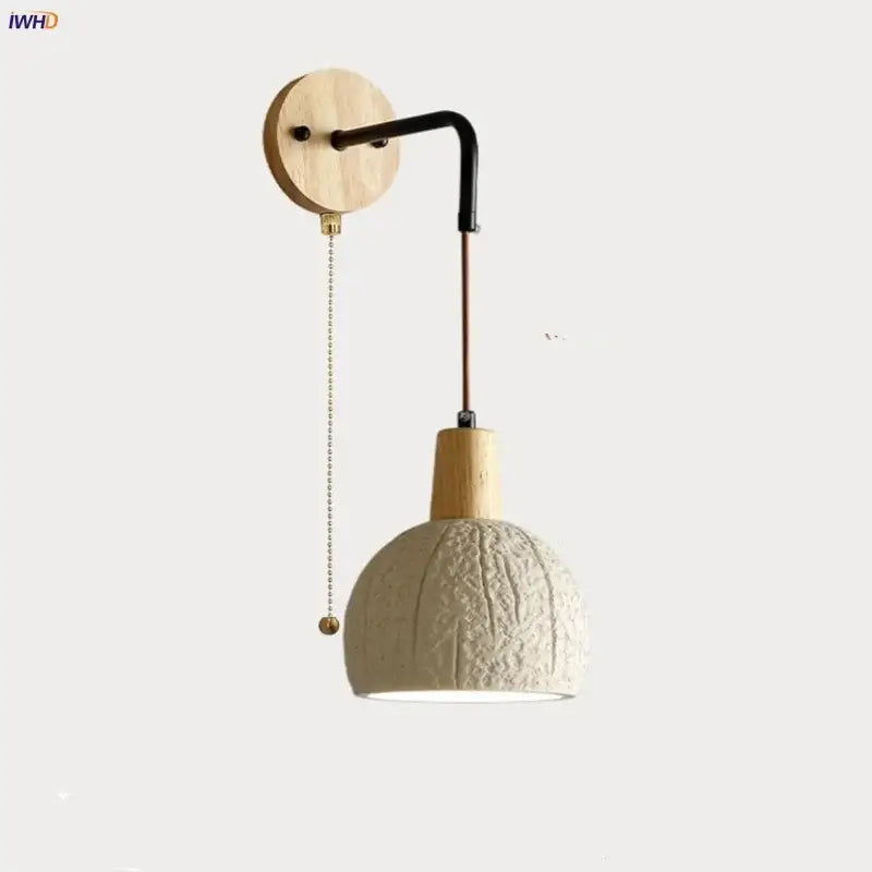 Beige ceramic wall sconce with pull chain switch for bedroom