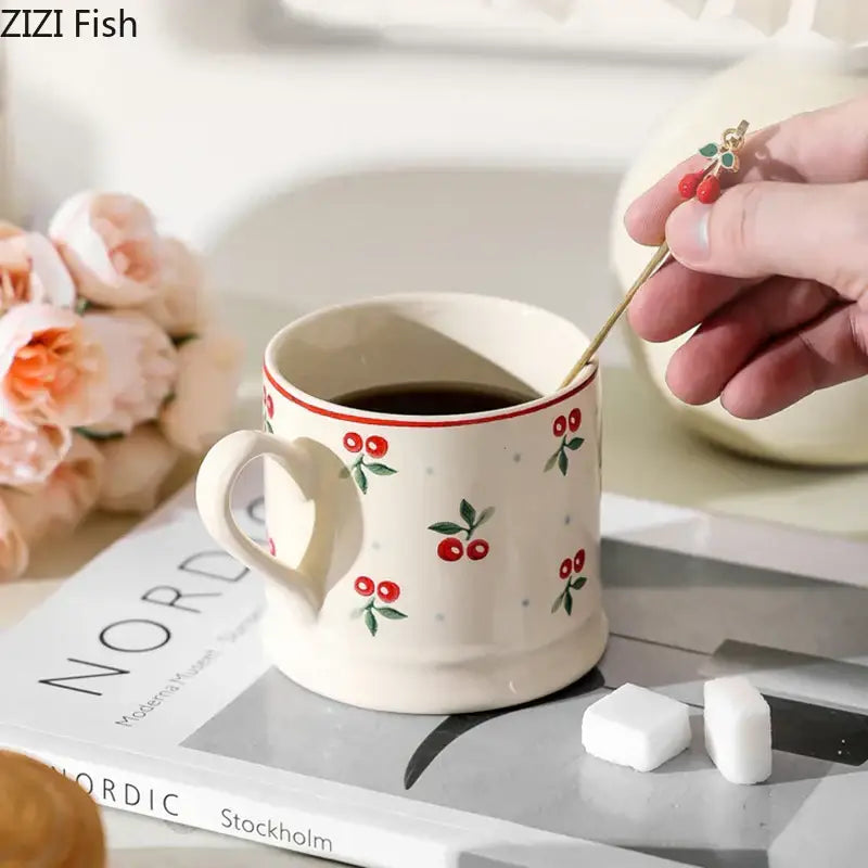 Cream cherry porcelain coffee mug with gold spoon – dining room tableware