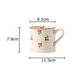 Cream cherry porcelain coffee mug with gold spoon – dining room tableware
