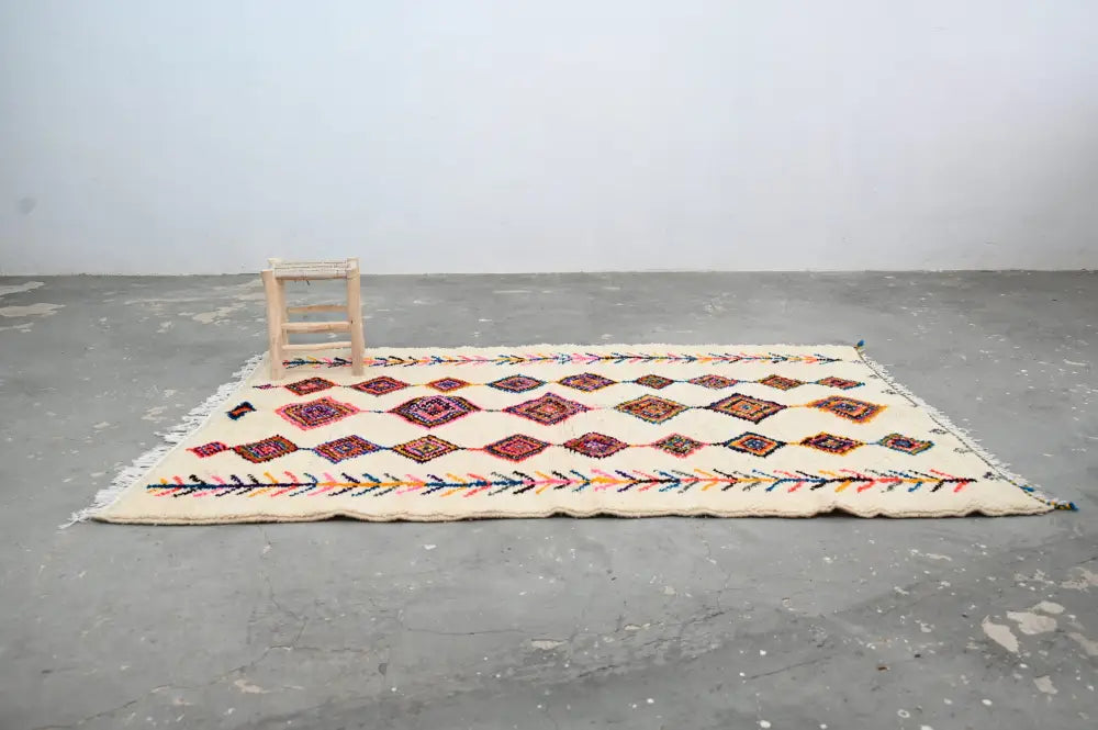 Handmade moroccan azilal rug beige vibrant colors living room decor