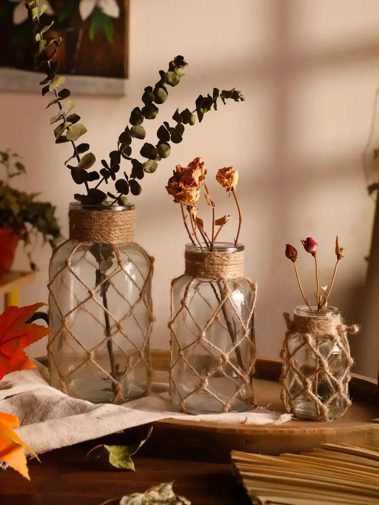 Rustic hanging glass vase with hemp rope twine netting – living room