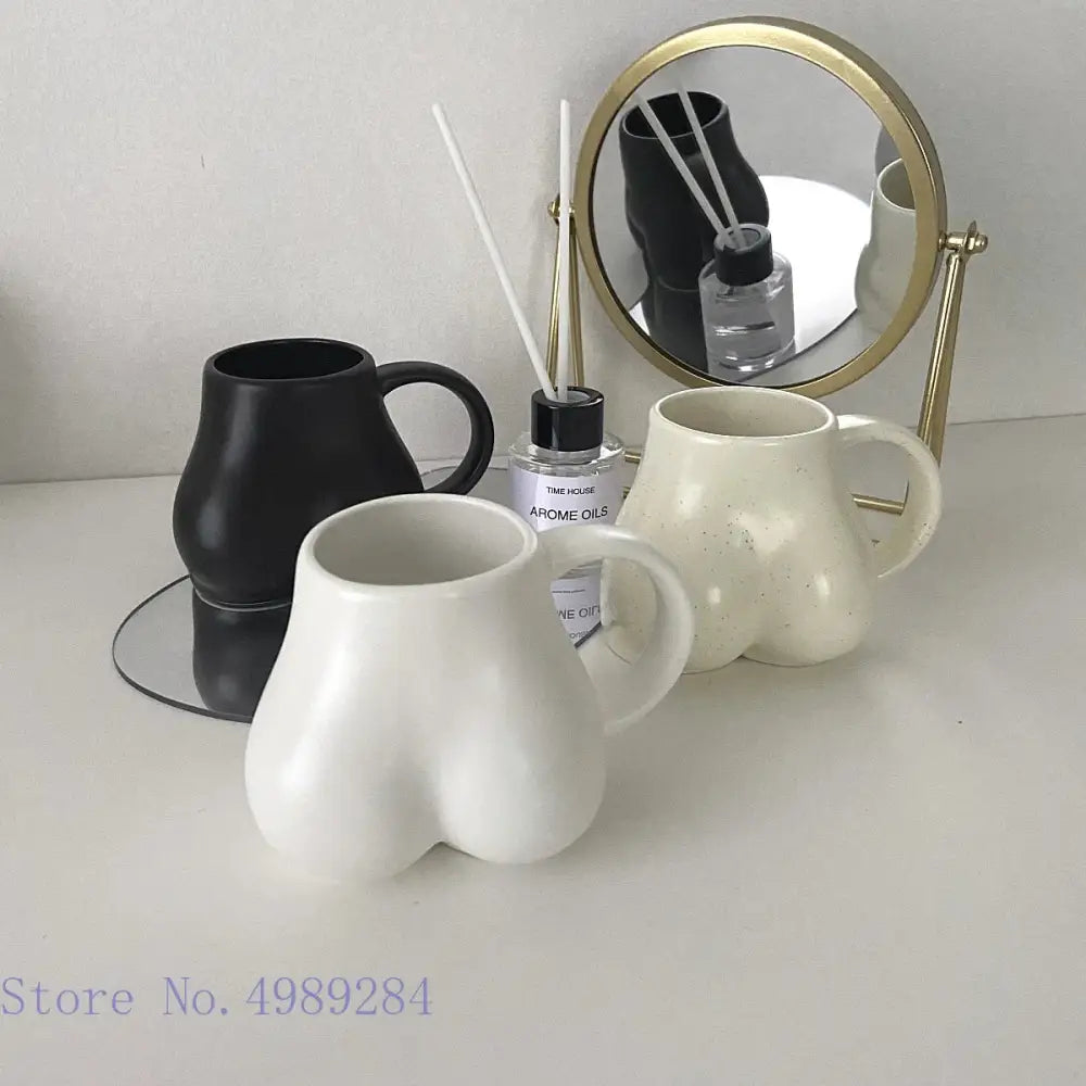 Playful white speckled butt shape ceramic coffee cup kitchen decor