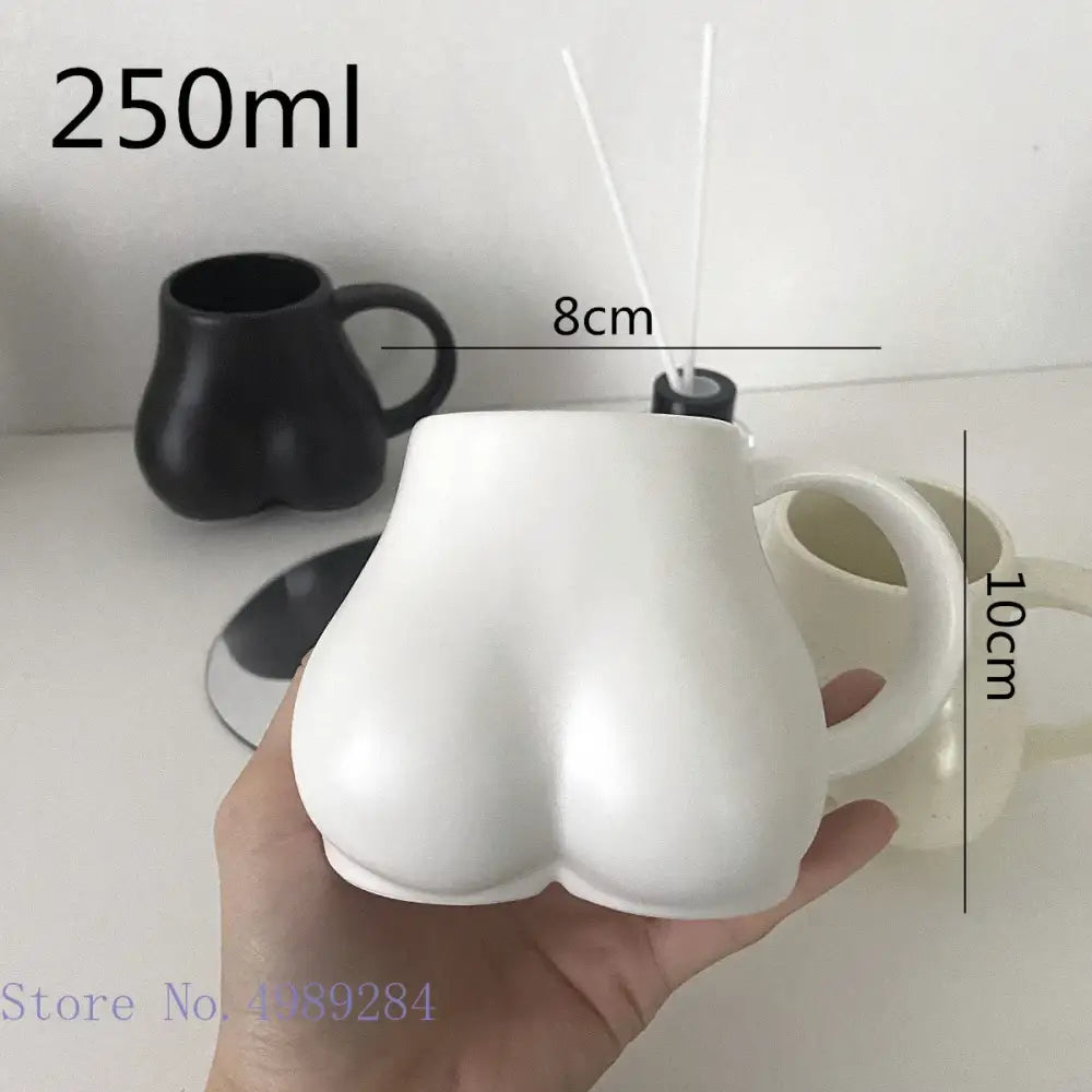 Playful white speckled butt shape ceramic coffee cup kitchen decor