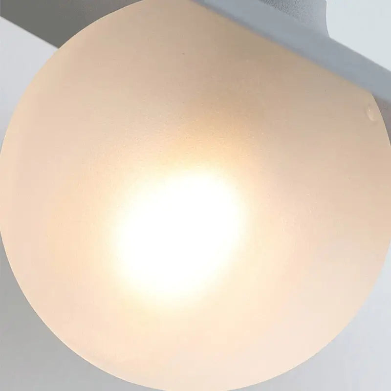 Modern matte black disc bedside wall light bedroom sconce