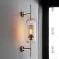 Modern moroccan brass and amber glass wall sconce bathroom light