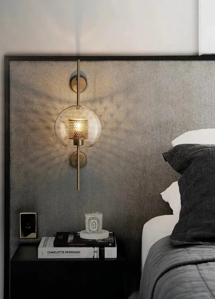 Modern moroccan brass and amber glass wall sconce bathroom light