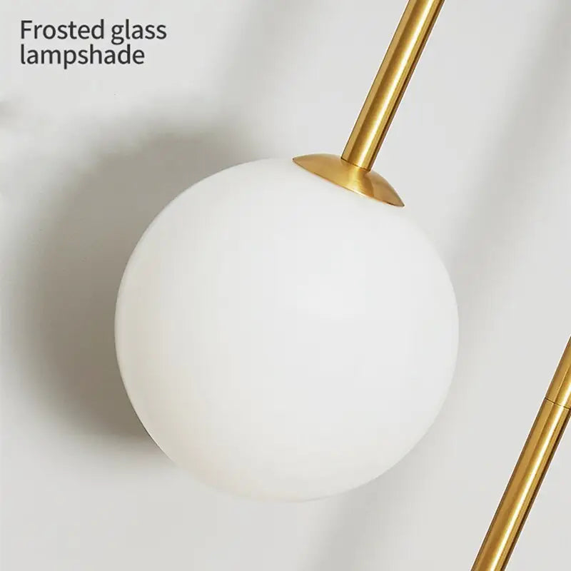 Minimalist moroccan gold wall sconces with frosted glass for bedroom