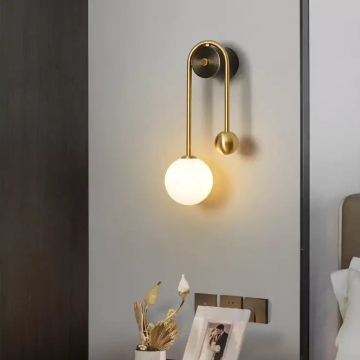 Minimalist moroccan gold wall sconces with frosted glass for bedroom
