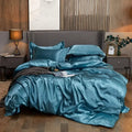 Teal satin bed sheet set with matching pillowcases for bedroom