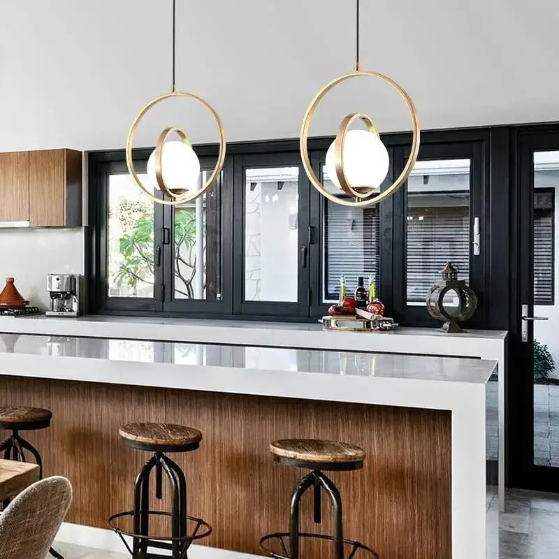 Modern rotating gold ring pendant light bedroom frosted glass globe