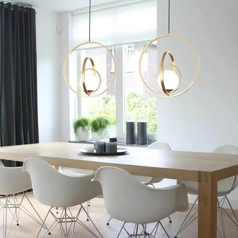 Modern rotating gold ring pendant light bedroom frosted glass globe