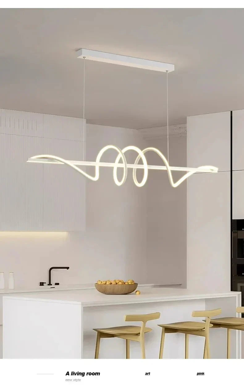 Sleek wavy pendant lights for dining room with brushed metallic finish