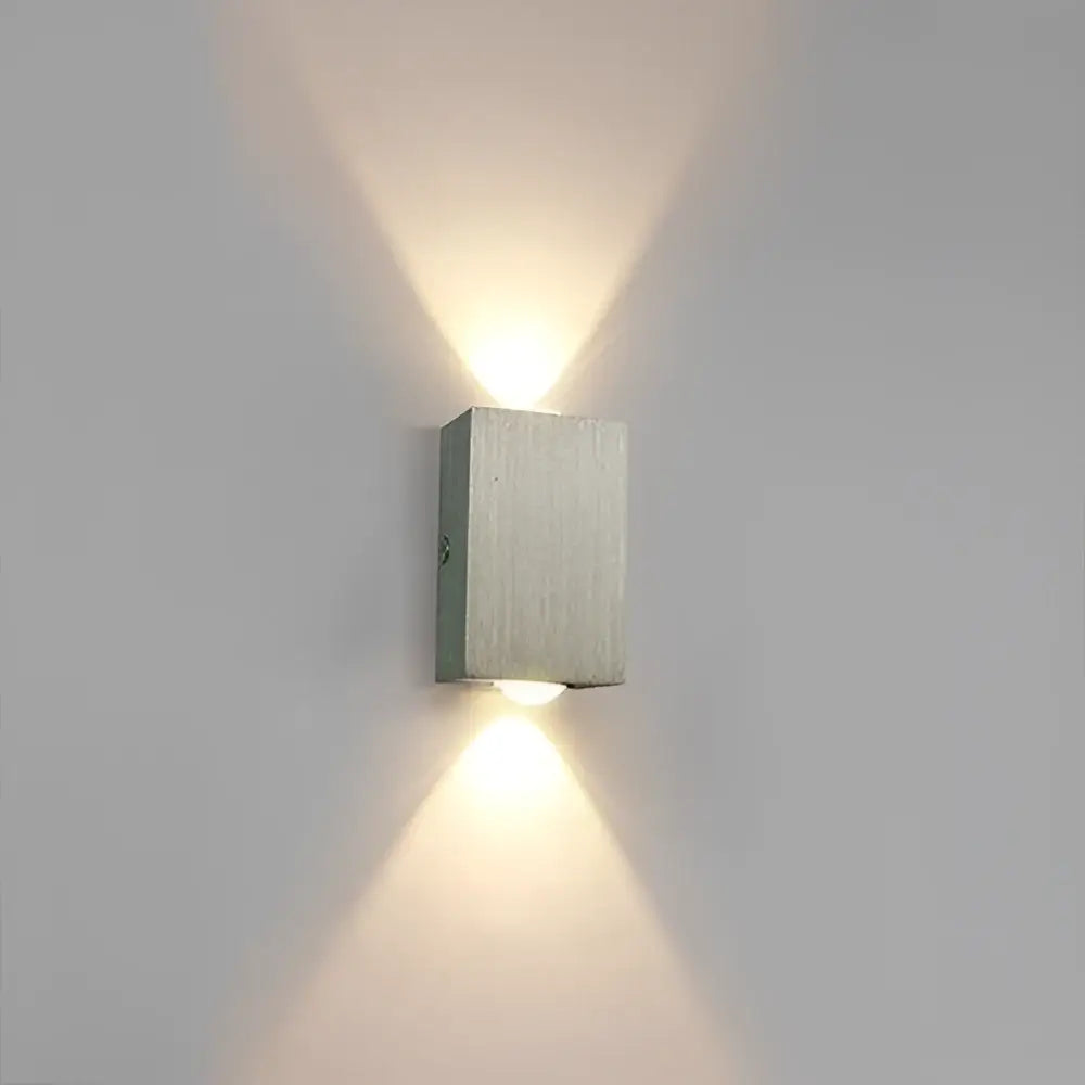 Modern brushed silver sphera wall sconces bedroom warm light beam