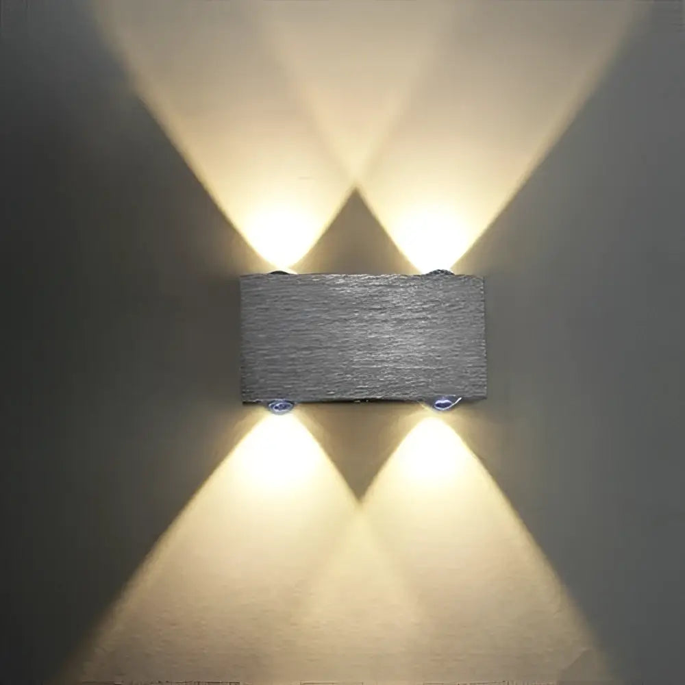 Modern brushed silver sphera wall sconces bedroom warm light beam