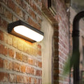 Modern black capsule flush wall sconce – bedroom led light
