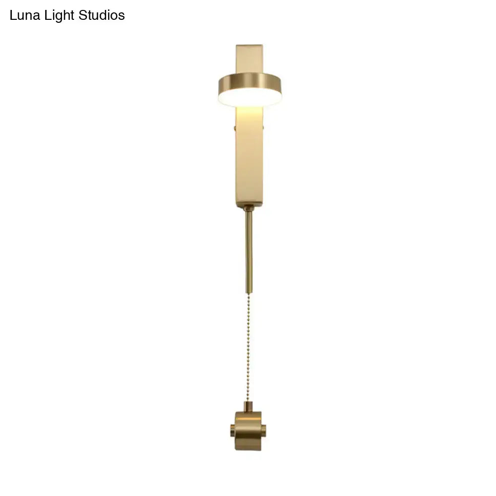 Modern brass l-shaped wall sconce with pull chain for living room