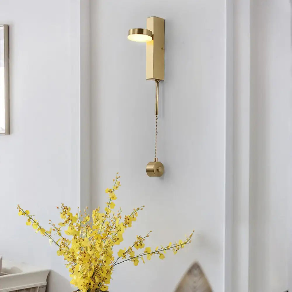 Modern brass l-shaped wall sconce with pull chain for living room