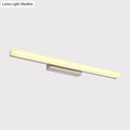Modern chrome led wall light with streamlined metal shade bathroom
