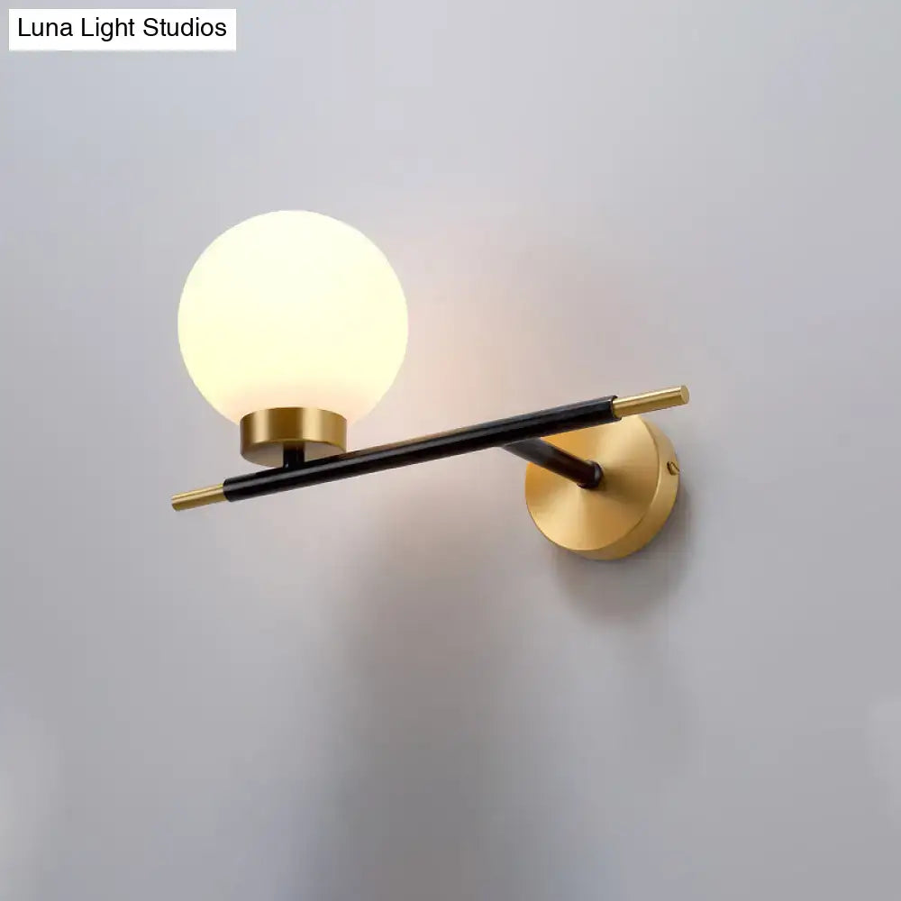 Post-modern white and brass sphere wall sconce bedroom light